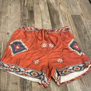Vibrant Orange and Blue Shorts with Geometric Patterns
